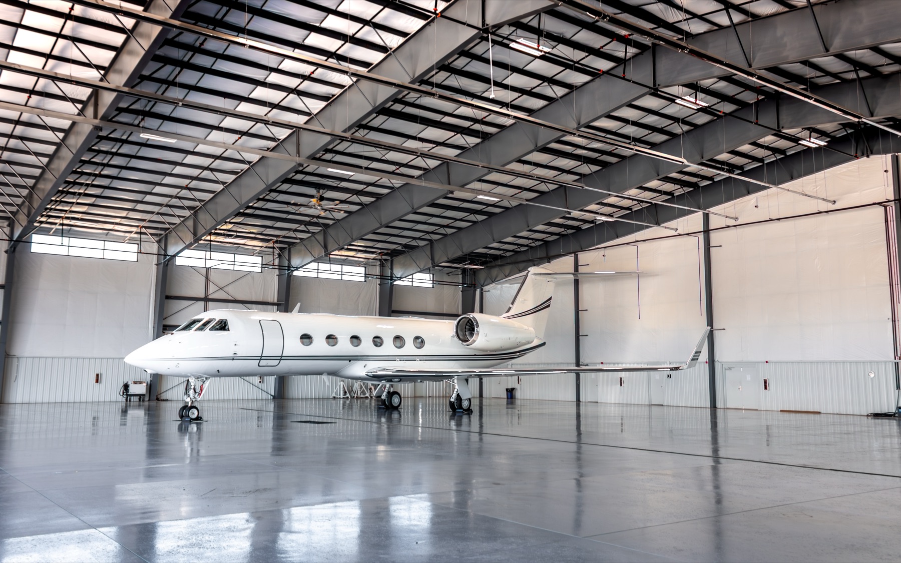 Gulfstream parked inside a hangar